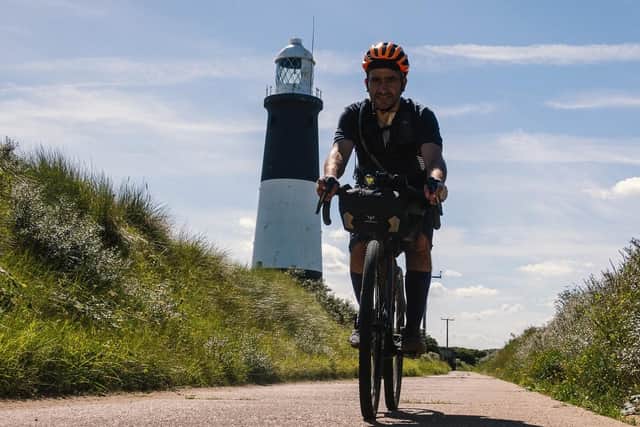 Markus Stitz cycling along the Yorkshire coast. (Pic credit: Route YC)