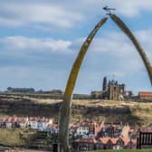 Date:22nd March 2018.
Picture James Hardisty.
East Coast Series.....Whitby. 
Possible Picture Post/Country Week.
Pictured A view towards Whitby Abbey through the replica Whale's jaw bone which replaced the original archway that was erected in 1853.
Camera Details: Nikon D5, Lens Nikon N VR 70-200mm, Shutter Speed 1/250s, Aperture f/5.6, ISO 80.