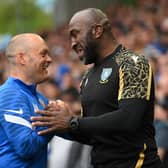 MEETING AGAIN: Alex Neil and Darren Moore ahead of last season's League One play-off tie. Picture: Michael Regan/Getty Images.