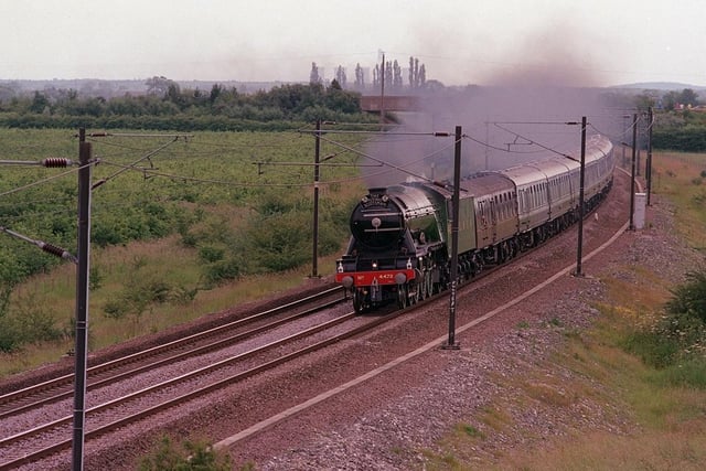 The Flying Scotsman made its way from Doncaster to York during its first journey after a three year restoration on July 4, 1999.