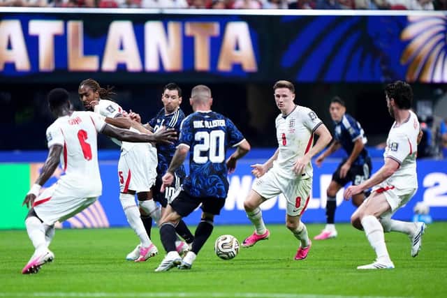 TOUGH BATTLE: England's Djed Spence and Argentina's Lionel Messi battle for the ball during the World Cup semi-final match at the Atlanta Stadium. Picture: Bradley Collyer/PA.