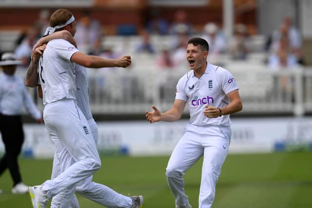 INTERNATIONAL CALLING: Matthew Potts celebrates with England team mate Stuart Broad after taking the wicket of South Africa's Kagiso Rabada at Lord's in August last year. Picture: Shaun Botterill/Getty Images