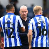 WORK TO DO: Sheffield Wednesday manager Henrik Pedersen (cente) (Image: Steve Ellis)