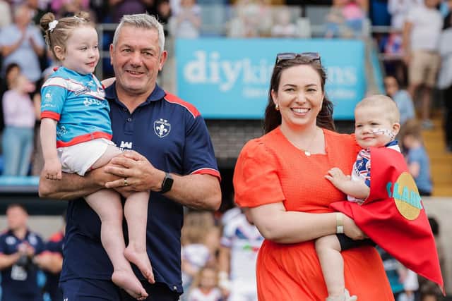 Daryl Powell enters the field with his daughter and grandchildren. (Photo: Alex Whitehead/SWpix.com)