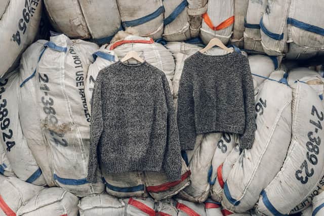 Mountains of fleece bales fill the British Wool depot in Bradford, where undyed wool is sorted to create Toast’s all British-made menswear and womenswear Grey Marled British Wool Seamless Sweaters. £175 each. Photograph by India Hobson.