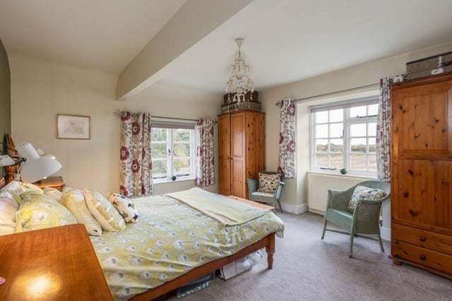 One of the three bedrooms with plenty of space and lovely views