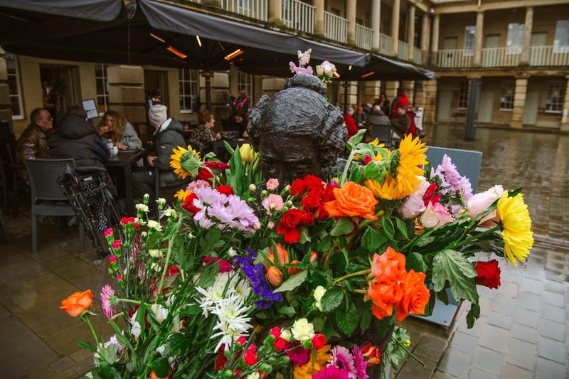 The sculpture was covered in colourful flowers, including roses, following the event