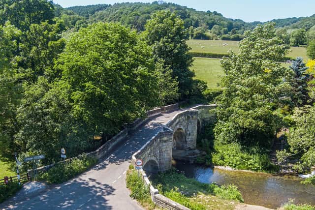 The old bridge over the stream that runs through the village of Rievaulx in North Yorkshire.