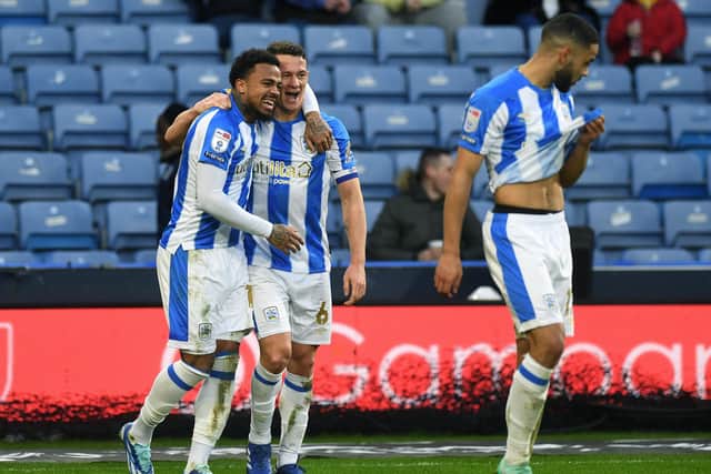 Huddersfield Town's Josh Koroma celebrates making it 2-0 against Sheffield Wednesday with Jonathan Hogg. Picture: Jonathan Gawthorpe.
