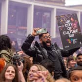 The moment Bradford finds out it has been awarded UK City of Culture 2025 in Centenary Square. Picture: Bruce Rollinson.