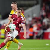 ASSURED: Leeds United debutant Nico Elvedi tussling with Chris Wood (front) (Image: Press Association)