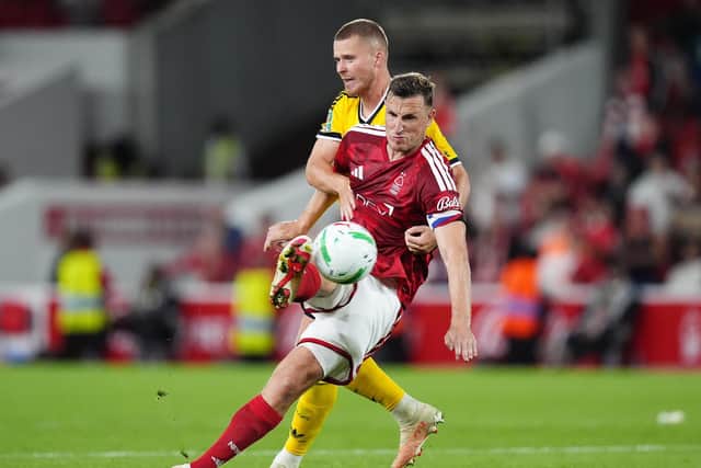 ASSURED: Leeds United debutant Nico Elvedi tussling with Chris Wood (front) (Image: Press Association)