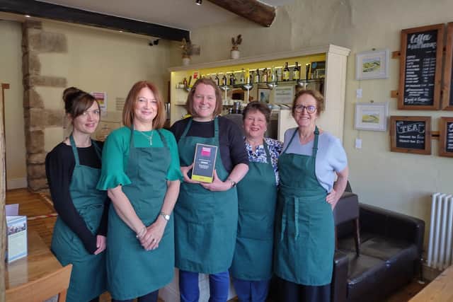 Members of The Folly Coffee House team with their award. From left to right - Amy Davies, Louise Constantine, Victoria Murray, Heather Murray and Freda Williamson