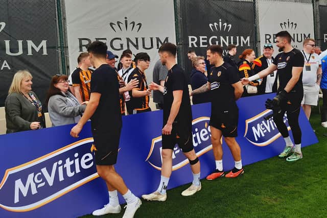 FANFARE: Hull City players shake hands with supporters at the end of Wednesday's training session in Antalya, Turkey