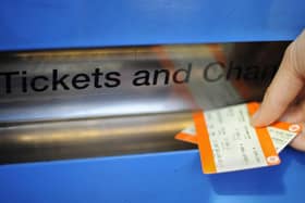 A person buying a train ticket from a ticket machine. PIC: Lauren Hurley/PA Wire