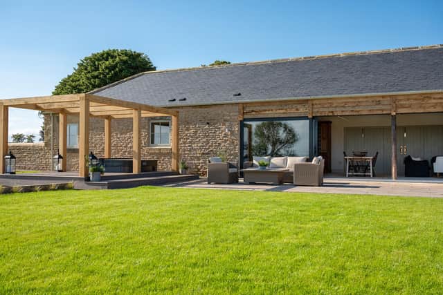 The converted barn is beautiful and the interiors make the most of the magnificent rural views.