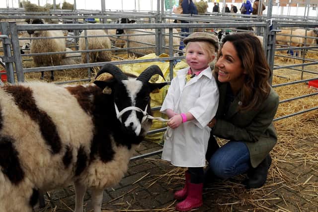 Countryside Live, Harrogate. Julia Bradbury and Esmay Duddin aged 3 from Northallerton pictured with her 1 year old Jacob named Tiddles..20th October 2019.Picture by Simon Hulme