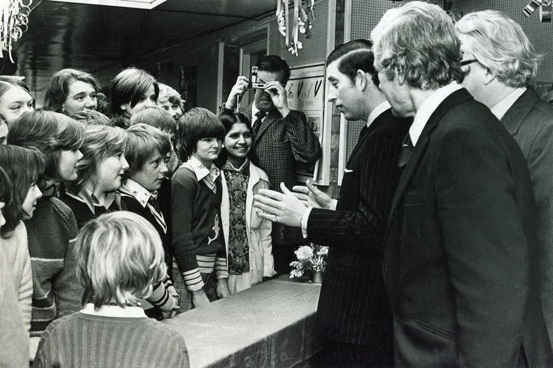 Prince Charles chats to pupils at the Maud Maxfield School on a visit to Sheffield in 1975.