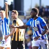 Huddersfield Town’s Bali Mumba celebrates scoring their side's second goal of the game during the Sky Bet League One match at Pirelli Stadium, Burton.