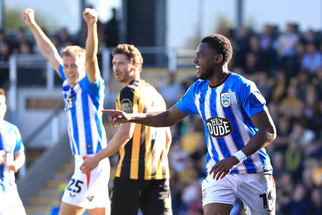 Huddersfield Town’s Bali Mumba celebrates scoring their side's second goal of the game during the Sky Bet League One match at Pirelli Stadium, Burton.