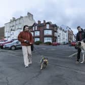 Abu next to other dogs. Abu, 2, a  Aksaray Malaklisi, is believed to be one of the biggest dogs in the UK. Abu and owner Dylan Shaw, 33, pictured in Saltburn, North Yorks, Oct 30 2023.