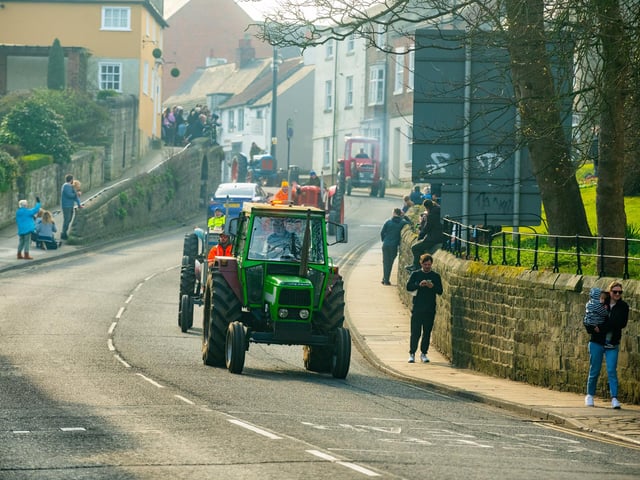 Tractors taking part in the charity run passing through Knaresborough. Picture: James Hardisty