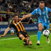Regan Slater gets the ball past Liam Kelly during Hull City's 1-1 draw with Coventry City. (Picture: Bruce Rollinson)