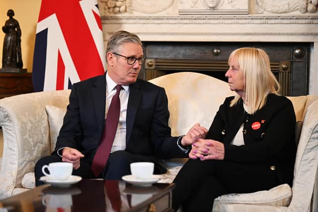 PM Sir Keir Starmer speaks with Margaret Aspinall, during a meeting with family members of the victims of the Hillsborough disaster, after the announcement of the Hillsborough Law. PIC: Leon Neal/PA Wire