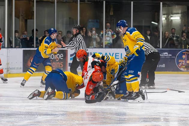 GETETING TO KNOW YOU: Leeds and Sheffield players get up close and personal during Saturday's fiery pre-season encounter at Elland Road Ice Arena. Picture; Charlotte/Knights Media.