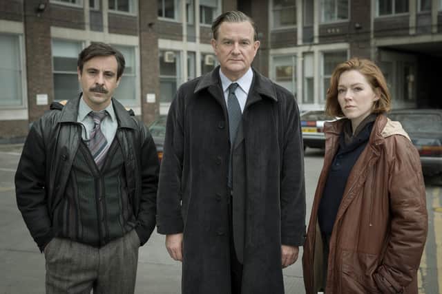 Emun Elliott as Tony Brightwell, Hugh Bonneville as Brian Boyce and Charlotte Spencer as Nicki Jennings in The Gold. Picture: BBC/Tannadice Pictures/Sally Mais