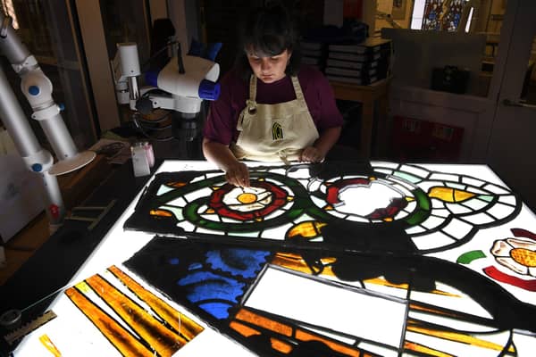 Sophie Gwynn Senior Stained Glass Conservator at York Glaziers Trust working on the Rose Window Picture Jonathan Gawthorpe