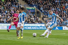 Huddersfield Town substitute Danny Ward strikes the post against Swansea City. Picture: Tony Johnson.
