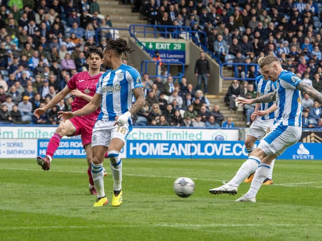 Huddersfield Town substitute Danny Ward strikes the post against Swansea City. Picture: Tony Johnson.