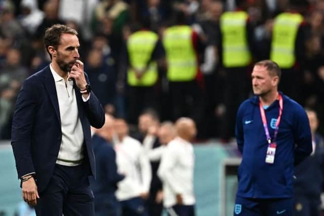 MUCH TO PONDER: England manager Gareth Southgate at full-time following his side's World Cup quarter-final exit, with assistant Steve Holland in the background