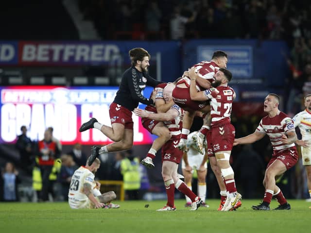 Wigan celebrate after hearing the final hooter. (Photo: Ed Sykes/SWpix.com)