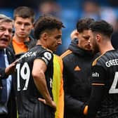 STARTING POINT: Sam Allardyce speaks to his Leeds United players on the pitch after their 2-1 defeat to Manchester City