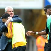 INVESTED: Bradford City manager Mark Hughes celebrates sealing a play-off at the end of last season, and although they didn't go on to win promotion, Hughes is said to be in it for the long haul at Valley Parade. (Picture: Simon Hulme)