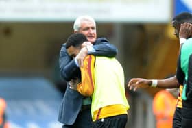 INVESTED: Bradford City manager Mark Hughes celebrates sealing a play-off at the end of last season, and although they didn't go on to win promotion, Hughes is said to be in it for the long haul at Valley Parade. (Picture: Simon Hulme)