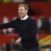 Charlton's English manager Dean Holden gestures on the touchline during the English League Cup quarter final football match between Manchester United and Charlton Athletic, at Old Trafford, in Manchester, north-west England on January 10, 2023. (Photo by OLI SCARFF/AFP via Getty Images)