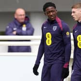 LATE CALL: Kobbie Mainoo, pictured left with Cole Palmer at St George's Park