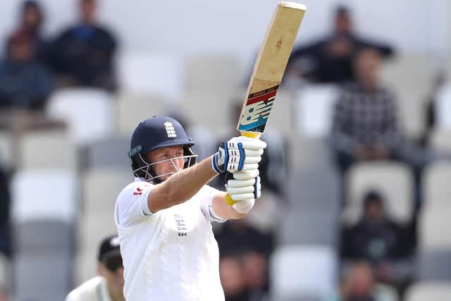 Joe Root hits out en route to his 29th Test century. Photo by Phil Walter/Getty Images.