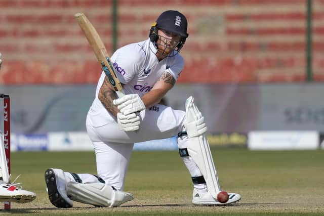 LEADING MAN: England's Ben Stokes guides the ball down to the long leg boundary as he helps his team to victory on the fourth day of the thirdTest match between Pakistan in Karachi.