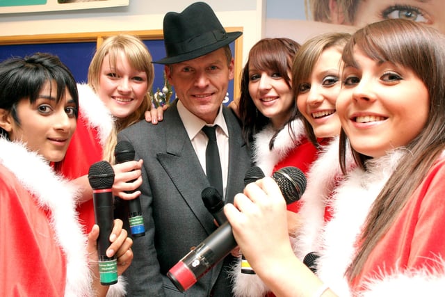 Caryl Wormald, Rachel Churm, Rachael Kenney, Ami Evans and Melissa Lye from Directions Theatre Arts with a Frank Sinatra lookalike at a charity evening in Boots.