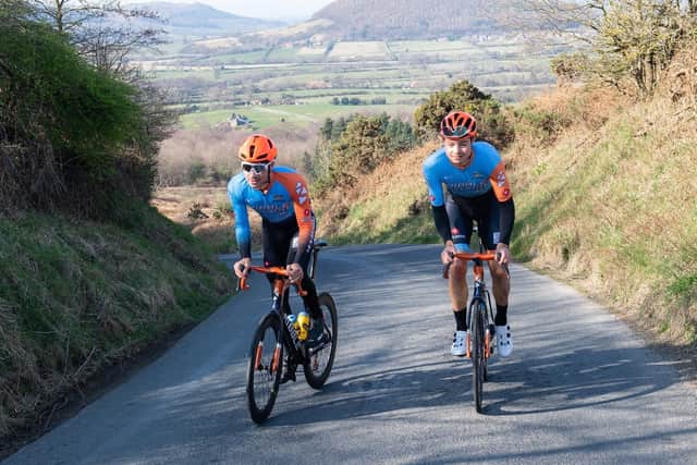 Harry Tanfield, right, and Charlie Tanfield, left, riding up Carlton Bank which will today stage the four day of the Tour of Britain.