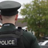 A female pedestrian has died after being struck by a car being pursued by police in Leeds.