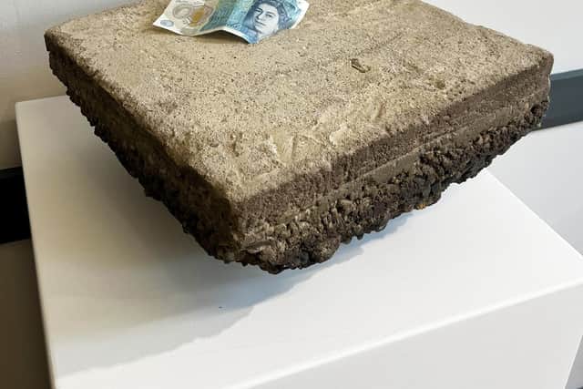 An artist who cast a five-pound note in concrete to highlight the cost-of-living crisis says her work has come “full circle” - after someone tried to nick the cash. Grace Clifford, 22, said she couldn’t “stop laughing” after a punter tried to nab the protruding note from her piece, Fiver Glued to Floor Prank *Not Clickbait*, last week.