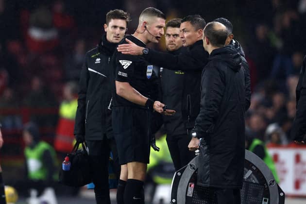 VAR COMMENTS: Sheffield United manager Paul Heckingbottom complains to referee Rob Jones during the 2-1 win over Wolverhampton Wanderers