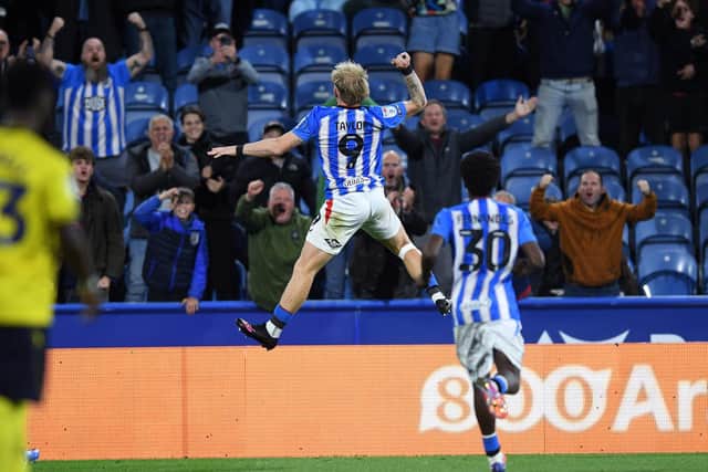Huddersfield Town's Joe Taylor celebrates his first goal against Oxford United. Picture: Jonathan Gawthorpe