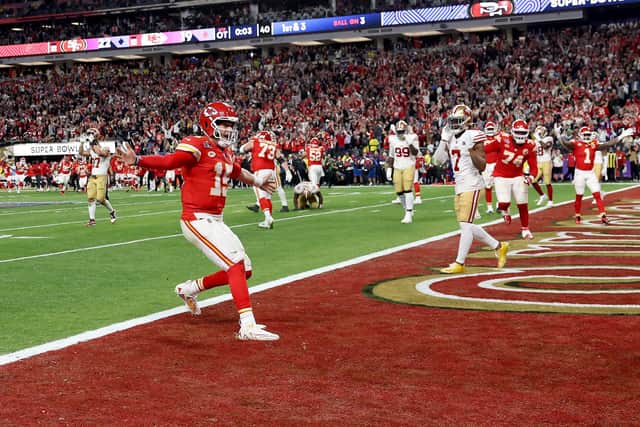 Mecole Hardman Jr. #12 of the Kansas City Chiefs celebrates with Patrick Mahomes #15 after scoring the game-winning touchdown in overtime to defeat the San Francisco 49ers (Picture: Ezra Shaw/Getty Images)