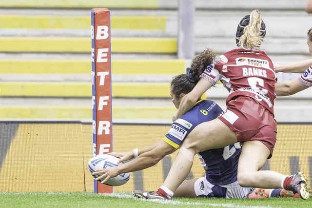 Final chance: Leeds’s Tara Moxon touches down for a try against Wigan as the Rhinos booked their place in the Challenge Cup final.